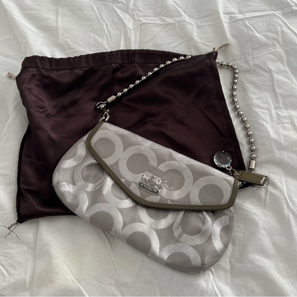Silver color coach pearl handle purse